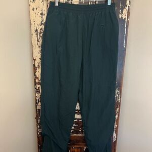 Men’s Vintage Reebok Nylon ankle zip track pants.